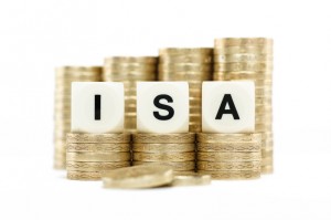ISA (Individual Savings Account) on gold coins with white backgr